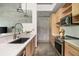Contemporary kitchen with stainless steel appliances, sleek countertops, and modern fixtures at 480 John Wesley Dobbs Ne Ave # 418, Atlanta, GA 30312