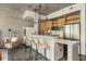 Open kitchen with breakfast bar, stainless steel appliances, and sleek cabinetry at 480 John Wesley Dobbs Ne Ave # 418, Atlanta, GA 30312