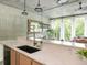 Bright kitchen with modern countertops, stainless steel appliances, and an open view to the living area at 480 John Wesley Dobbs Ne Ave # 418, Atlanta, GA 30312