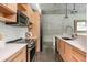 Well-equipped kitchen boasting stainless steel appliances, light wood cabinets, and modern countertops at 480 John Wesley Dobbs Ne Ave # 418, Atlanta, GA 30312