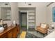 Bright living area features wood furniture, modern decor, view of shelving and concrete floors at 480 John Wesley Dobbs Ne Ave # 418, Atlanta, GA 30312