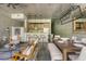 Spacious open-concept living and dining area featuring modern design and concrete ceilings at 480 John Wesley Dobbs Ne Ave # 418, Atlanta, GA 30312