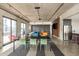 Modern lounge area with sleek furnishings, a large dining table, and a stainless steel refrigerator at 480 John Wesley Dobbs Ne Ave # 418, Atlanta, GA 30312