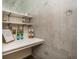 Pantry space with white shelves and concrete wall at 480 John Wesley Dobbs Ne Ave # 418, Atlanta, GA 30312
