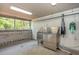 Convenient pet washing station with stainless steel sink and apron at 480 John Wesley Dobbs Ne Ave # 418, Atlanta, GA 30312