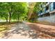 Scenic walking path lined with mature trees and manicured landscaping at 480 John Wesley Dobbs Ne Ave # 418, Atlanta, GA 30312