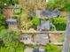 Overhead shot showcasing the meticulously landscaped yard, putting green, and various structures on the property at 603 E Paces Ferry Ne Rd, Atlanta, GA 30305