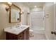 Bathroom with granite countertops, stylish vanity, and tile floors at 603 E Paces Ferry Ne Rd, Atlanta, GA 30305