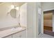 Well-maintained bathroom with a single sink, cabinet, and tiled shower at 603 E Paces Ferry Ne Rd, Atlanta, GA 30305