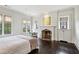 Inviting bedroom with fireplace and backyard views from multiple windows at 603 E Paces Ferry Ne Rd, Atlanta, GA 30305