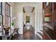 Elegant foyer with hardwood floors, white trim, and a view through the home at 603 E Paces Ferry Ne Rd, Atlanta, GA 30305