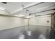 Large, well-lit garage with polished floors and ample space for vehicles and storage at 603 E Paces Ferry Ne Rd, Atlanta, GA 30305