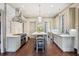 Spacious gourmet kitchen with stainless steel appliances, marble counters, island and tile backsplash at 603 E Paces Ferry Ne Rd, Atlanta, GA 30305