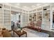 Spacious living room featuring custom built-ins and elegant furnishings at 603 E Paces Ferry Ne Rd, Atlanta, GA 30305