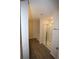 Bright bathroom featuring a glass-door shower and wood-look flooring at 6348 Lanier Harbor Lndg, Buford, GA 30518