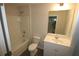 A full bath, toilet, shower, and modern vanity at 6348 Lanier Harbor Lndg, Buford, GA 30518