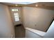 Entryway with wood-look flooring and a white front door at 6348 Lanier Harbor Lndg, Buford, GA 30518