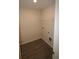 This is a compact laundry room with washer and dryer hookups at 6348 Lanier Harbor Lndg, Buford, GA 30518