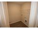 Dedicated laundry room space with wood-look flooring at 6348 Lanier Harbor Lndg, Buford, GA 30518