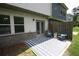 Cozy backyard patio with a modern outdoor rug and seating area at 6348 Lanier Harbor Lndg, Buford, GA 30518