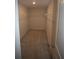 Large walk-in closet with built-in shelving at 6348 Lanier Harbor Lndg, Buford, GA 30518