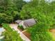 Serene aerial view of a secluded home nestled among lush trees and greenery at 258 Lancaster Cir, Marietta, GA 30066