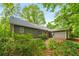 Home exterior with wooded lot and brick path at 258 Lancaster Cir, Marietta, GA 30066