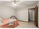 Bedroom featuring neutral carpet, a ceiling fan and a closet at 258 Lancaster Cir, Marietta, GA 30066