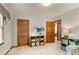 Neutral bedroom with closet, shelving, and wood doors at 258 Lancaster Cir, Marietta, GA 30066