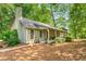 Inviting home featuring a cozy front porch, ideal for relaxing and enjoying the serene surroundings at 258 Lancaster Cir, Marietta, GA 30066