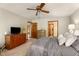 Spacious bedroom with a ceiling fan and an ensuite bathroom at 258 Lancaster Cir, Marietta, GA 30066