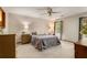 Cozy bedroom with ceiling fan, carpet, and natural light at 258 Lancaster Cir, Marietta, GA 30066