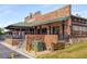 Exterior of a charming brick market building with outdoor seating and a welcoming atmosphere at 258 Lancaster Cir, Marietta, GA 30066