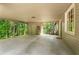 Covered patio with storage area overlooking wooded backyard at 258 Lancaster Cir, Marietta, GA 30066