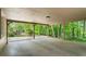 Spacious covered patio with view of wooded backyard at 258 Lancaster Cir, Marietta, GA 30066