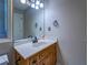 Bathroom with single sink vanity and modern faucet at 2903 Southpark Sw Ter, Conyers, GA 30094