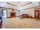 Cozy living room with a brick fireplace and access to the outdoor deck at 2903 Southpark Sw Ter, Conyers, GA 30094
