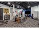 Finished basement with fitness area, neutral carpet, and open ceiling; perfect for recreation and relaxation at 76 Hollis Cir, Dallas, GA 30157
