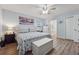 Bedroom offers hardwood flooring with access to the ensuite bathroom at 76 Hollis Cir, Dallas, GA 30157