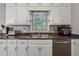 Well-equipped kitchen features stainless steel appliances, ample cabinetry, and a stainless steel sink at 76 Hollis Cir, Dallas, GA 30157