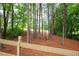 Wooded backyard with walking trail at 105 Thorncliff Way, Acworth, GA 30101