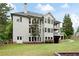 Well-maintained home features a screened-in porch, back deck, and beautiful backyard at 105 Thorncliff Way, Acworth, GA 30101