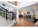 Inviting playroom features hardwood floors, black and white rug, and is filled with toys and books at 105 Thorncliff Way, Acworth, GA 30101