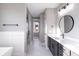 Modern bathroom with white quartz countertops, glass shower, and sleek fixtures at 170 Paislee Park (Lot #8 Paislee Park) Dr, Fayetteville, GA 30215