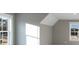 Sun-drenched room with bright windows, neutral walls, and carpet, creating a peaceful space at 170 Paislee Park (Lot #8 Paislee Park) Dr, Fayetteville, GA 30215