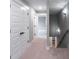 Bright hallway with white doors and neutral carpet leads to other rooms, offering a seamless flow at 170 Paislee Park (Lot #8 Paislee Park) Dr, Fayetteville, GA 30215