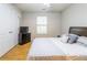 This bedroom features a queen bed, natural light and a closet with double doors at 176 Darbys Crossing Ct, Hiram, GA 30141
