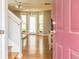 Open living room featuring hardwood floors, neutral walls, and abundant natural light at 176 Darbys Crossing Ct, Hiram, GA 30141
