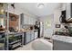 Modern kitchen featuring gray cabinets, granite countertops, stainless steel appliances, and ample storage at 1941 Headland Dr, East Point, GA 30344