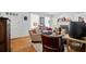 Cozy living room featuring hardwood floors, a fireplace, comfortable seating, and abundant natural light at 1941 Headland Dr, East Point, GA 30344